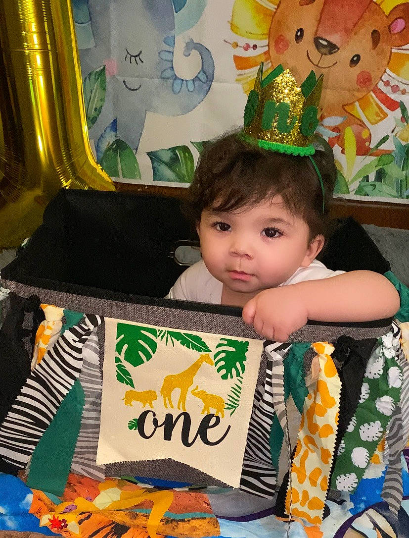 Jaxx Phoenix is registered to the contest to win money with this photo: baby, child, comfort_food, event, fun, green, happy, junk_food, leisure, party_supply, person, photograph, play, product, recreation, room, snapshot, sweetness, toddler, toy