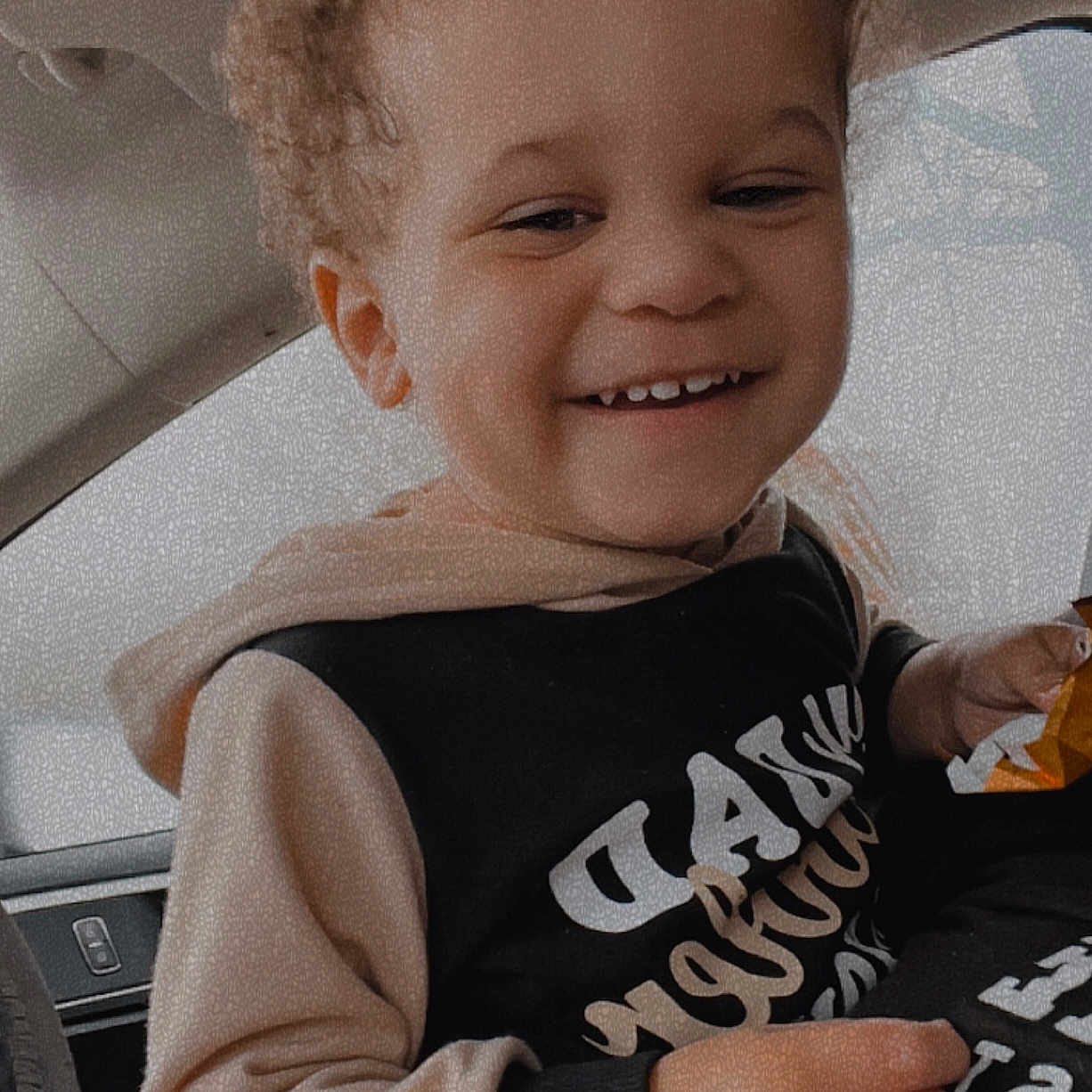 Izaiah joined the competition — help win amazing prizes! baby, babylaughing, bodypart, clothing, face, finger, hand, happy, head, knitwear, laughing, machine, person, photography, portrait, sitting, smile, sweater, t_shirt, wheel