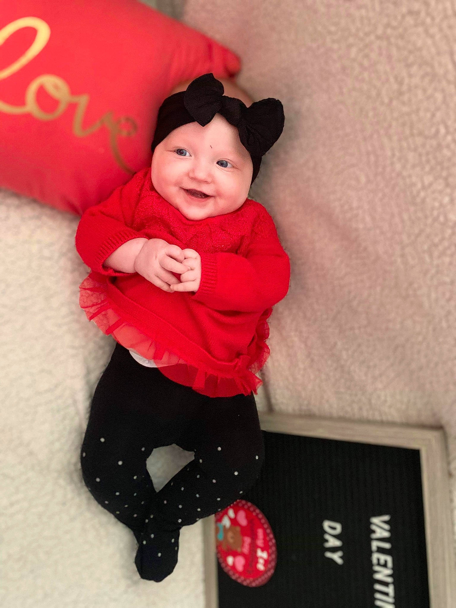 Emberleigh joined the competition — help win amazing prizes! baby, baby_toddler_clothing, beauty, child, ear, joy, outerwear, pattern, person, pink, red, skin, sleeve, smile, toddler