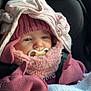 Ana participe au concours pour gagner de l'argent avec cette photo : baby, pacifier, pink, knit_hat, mittens, blanket, car_seat, winter_clothing, face, child, cute, infant, warm, soft_texture, portrait, closeup, cozy, sleepy, indoor, bundle