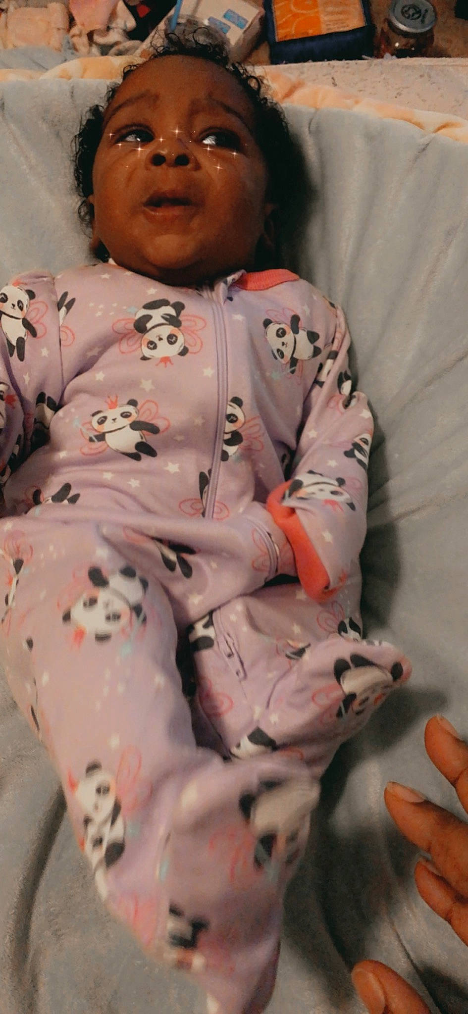 Ashayla is registered to the contest to win money with this photo: baby_toddler_clothing, button, carmine, child, dress, finger, fur, gesture, hand, jacket, microphone, pattern, person, pink, sitting, skin, sleeve, thigh, toddler, uniform