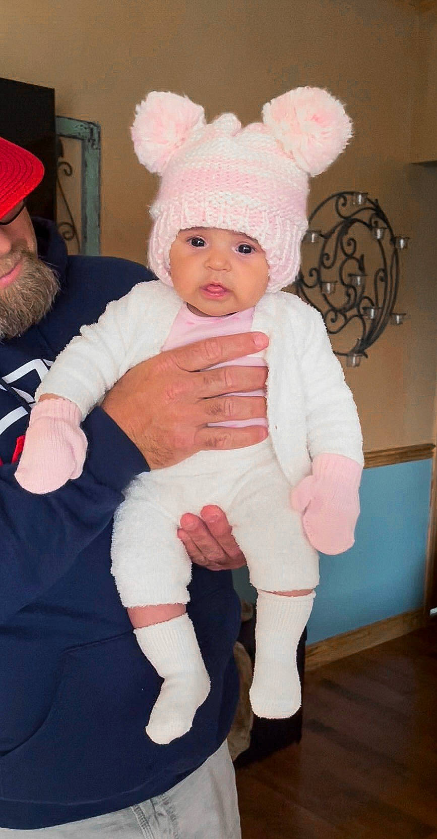 Avayah joined the competition — help win amazing prizes! baby, baby_toddler_clothing, baseball_cap, beard, cap, child, costume, costume_hat, event, fur, hat, headgear, headwear, human_body, knee, lap, person, pink, sock, sun_hat