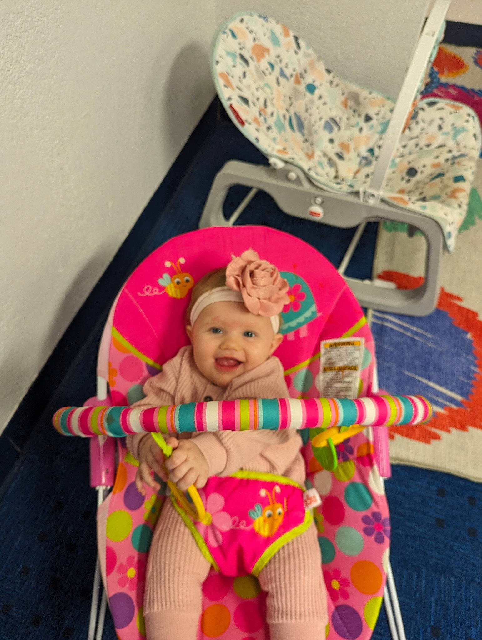 Peyton joined the competition — help win amazing prizes! baby, baby_products, baby_toddler_clothing, baby_toys, chair, child, comfort, event, fun, head, headwear, joy, leisure, linens, magenta, pattern, person, pink, room, sitting
