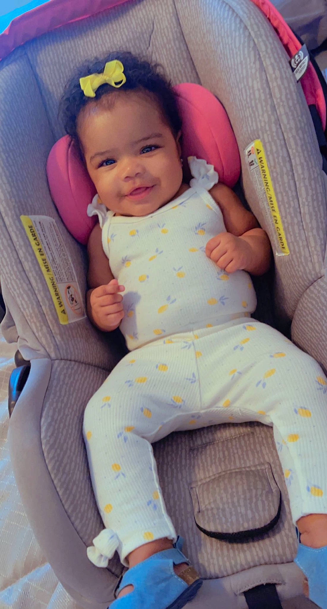 Jourdyn is registered to the contest to win money with this photo: baby, baby_products, baby_safety, baby_toddler_clothing, chair, cheek, child, comfort, face, happy, head, joy, lap, nail, pattern, person, pink, sitting, skin, smile