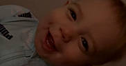 Kacey is registered to the contest to win money with this photo: baby, casual, child, clothing, cute, expression, face, happy, head, human, indoor, jacket, joy, light, person, portrait, puma, smiling, toddler, young_child