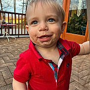 Kacey is registered to the contest to win money with this photo: blue_eyes, boy, brick_floor, casual_clothing, child, cute, daylight, door, glass, happy, messy_face, outdoor, patio, person, portrait, red_shirt, smiling, toddler, wooden_railing, young_child