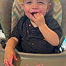toddler, high_chair, messy, food, pink_food, smiling, baby, eating, face, hand, tray, indoor, child, cute, happy, meal_time, clothing, hair, seat, expression