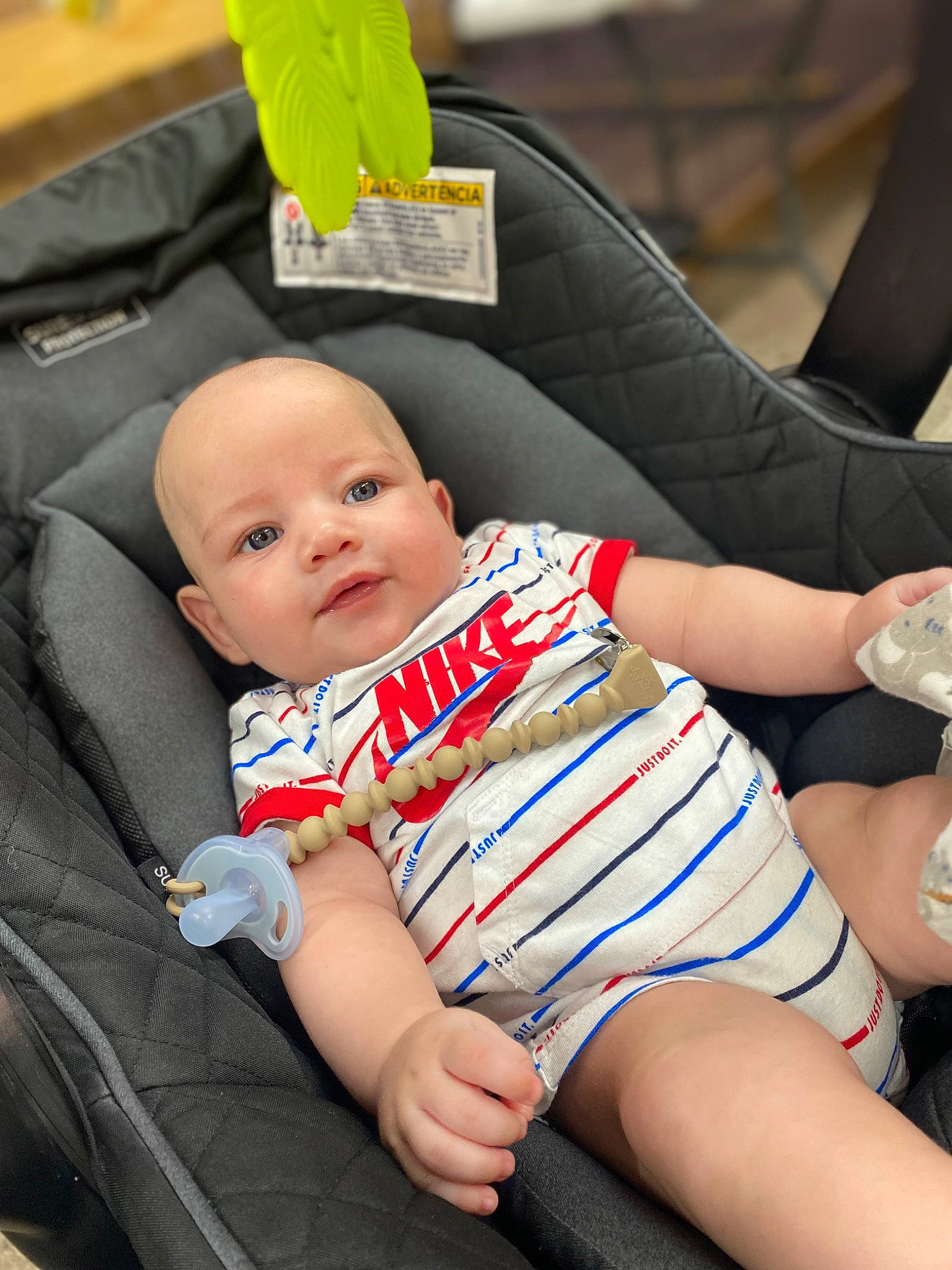 Fernando is registered to the contest to win money with this photo: auto_part, baby, baby_carriage, baby_products, baby_toddler_clothing, cheek, child, comfort, elbow, finger, foot, human_leg, knee, lap, leg, nail, person, sitting, skin, thigh