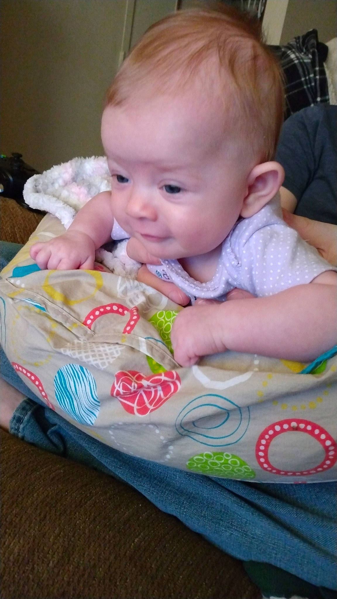 Lani joined the competition — help win amazing prizes! baby, baby_products, baby_toddler_clothing, biting, cheek, child, ear, fun, grass, happy, head, iris, pattern, person, sitting, skin, smile, toddler