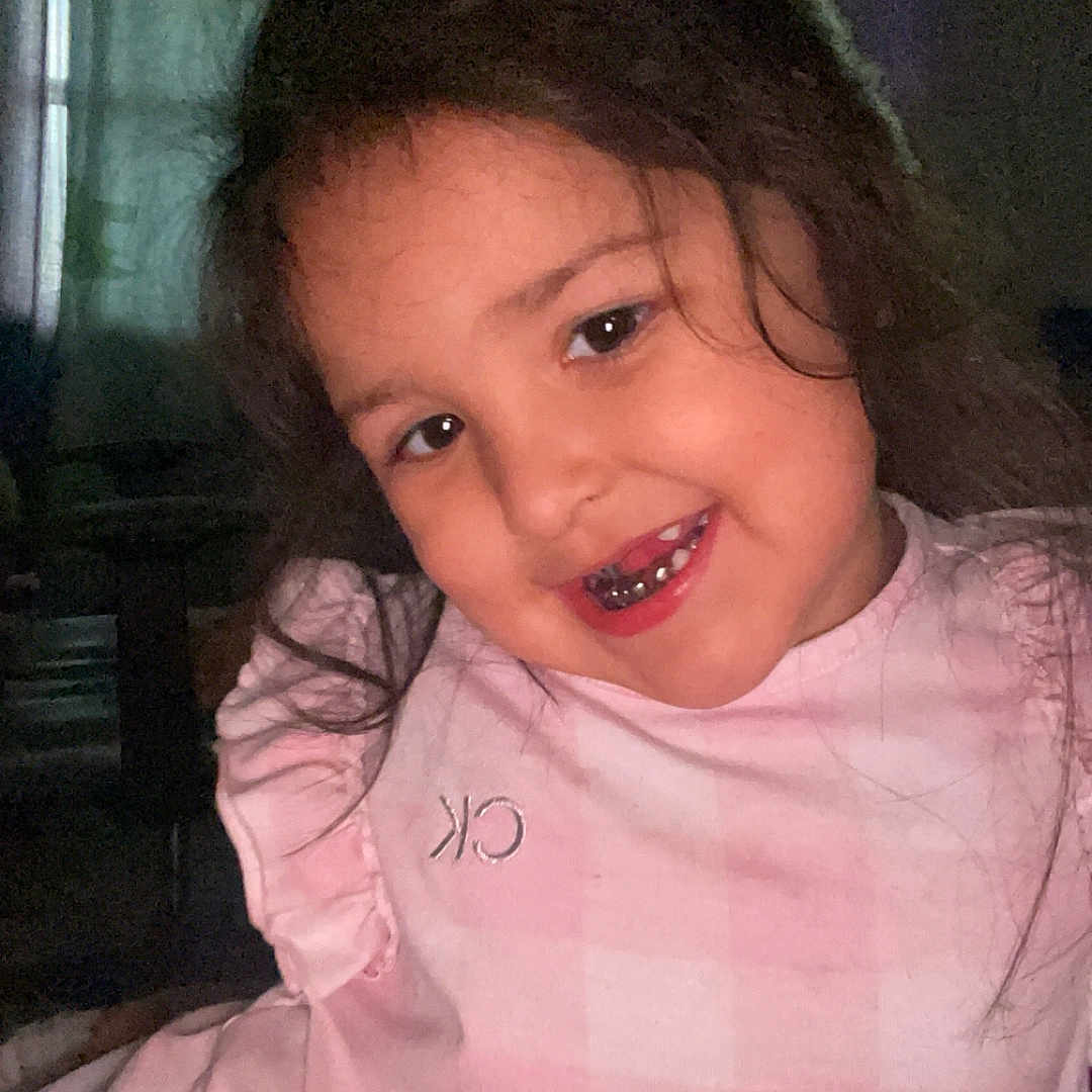 Yamila joined the competition — help win amazing prizes! child, girl, smiling, face, pink_clothing, long_hair, indoors, portrait, happy, cute, casual, human, person, childhood, young, toddler, fashion, child_fashion, expression, teeth