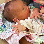 Waverly Hope Thomas is registered to the contest to win money with this photo: baby, newborn, blanket, hand, fingers, person, skin, clothing, fabric, nails, colorful, arm, infant, cute, portrait, closeup, touch, care, love, family