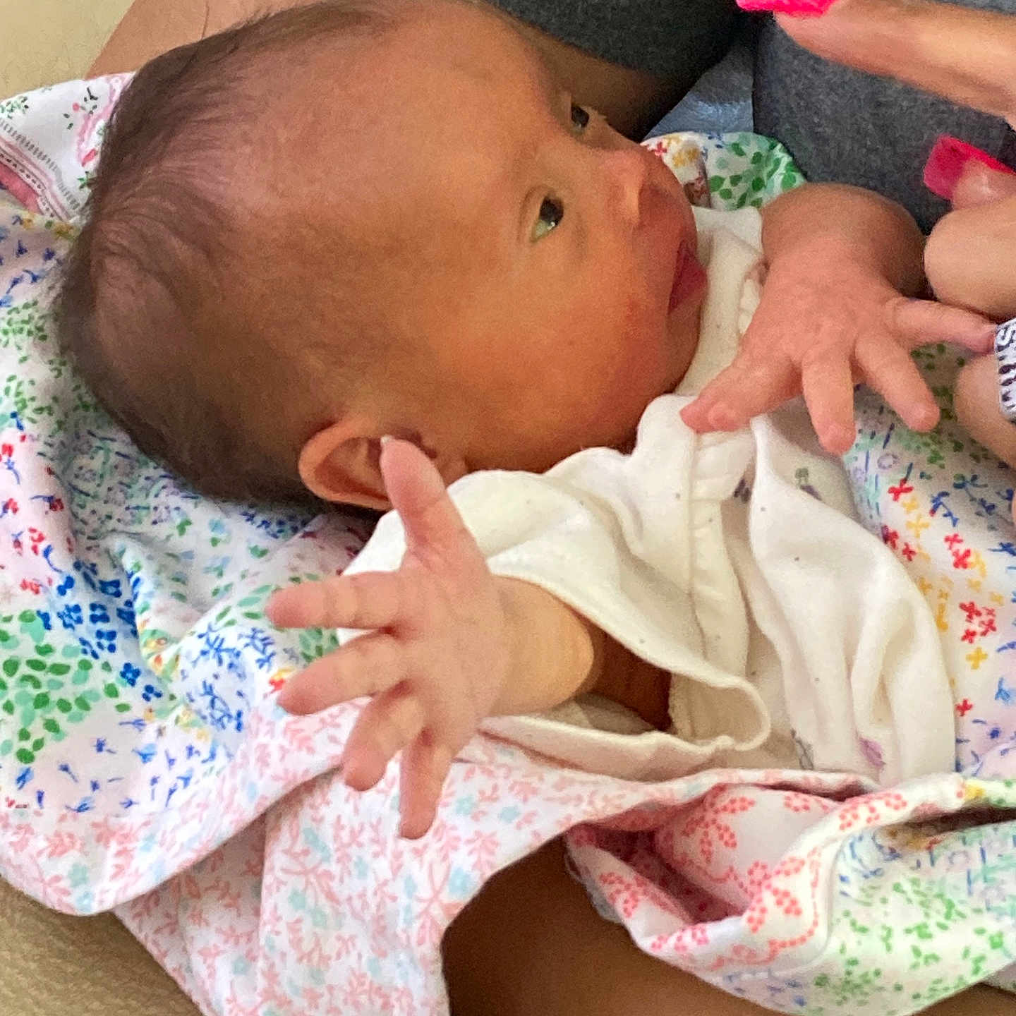 Waverly Hope Thomas is registered to the contest to win money with this photo: arm, baby, blanket, care, closeup, clothing, colorful, cute, fabric, family, fingers, hand, infant, love, nails, newborn, person, portrait, skin, touch