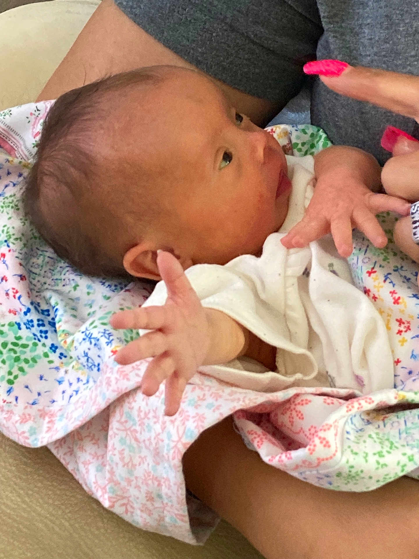 Waverly Hope Thomas is registered to the contest to win money with this photo: baby, newborn, blanket, hand, fingers, person, skin, clothing, fabric, nails, colorful, arm, infant, cute, portrait, closeup, touch, care, love, family