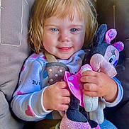 Jessica joined the competition — help win amazing prizes! blue_eyes, child, childhood, clothing, cozy, cuddling, cute, cute_face, fabric, hands, happy, indoor, minnie_mouse, pink, plush_toy, portrait, seated, smiling, soft_toy, toddler