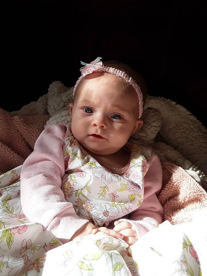 Laney joined the competition — help win amazing prizes! baby, cheek, child, eye, hair_accessory, headgear, person, sitting, skin, smile, toddler