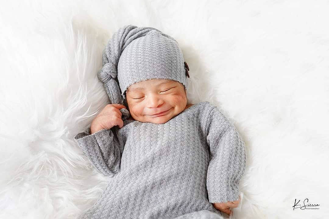 Leonel joined the competition — help win amazing prizes! baby, cap, comfort, eye, freezing, grey, hand, happy, head, headgear, headwear, hood, human_body, knit_cap, linens, person, sleeve, smile, snow, toddler