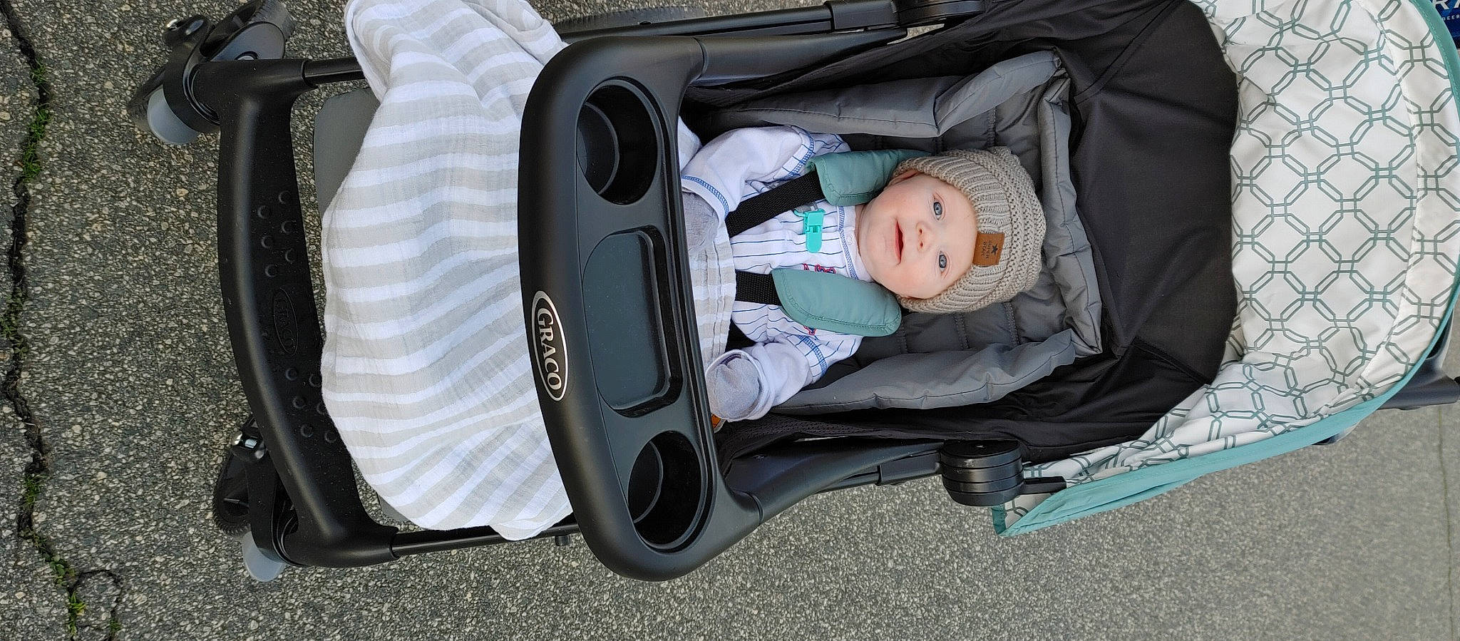 Lake is registered to the contest to win money with this photo: audio_equipment, auto_part, automotive_design, automotive_exterior, baby, baby_carriage, baby_products, baby_toddler_clothing, bag, child, comfort, headwear, helmet, luggage_and_bags, person, personal_protective_equipment, sitting, sneakers, toddler