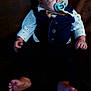 baby, infant, pacifier, bow_tie, vest, shirt, suit, barefoot, couch, furniture, indoor, child, portrait, cute, small_hands, small_feet, expression, looking_away, clothing, seated