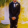 Samuel joined the competition — help win amazing prizes! boy, child, tuxedo, smile, outdoor, grass, plant, formal_wear, portrait, standing, young, greenery, nature, flower, boutonniere, shoes, hands, happy, sunlight, celebration