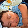 baby, blanket, blue_shirt, child, closeup, cushion, cute, face, indoors, infant, peaceful, pillow, portrait, relaxation, rest, sleep, sleeping, soft_lighting, toddler, wooden_wall