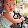 baby, car, child, curious, dashboard, expression, face, ford_logo, green_top, hands, house, indoor, interior, keys, portrait, seat, steering_wheel, suburban, toddler, window