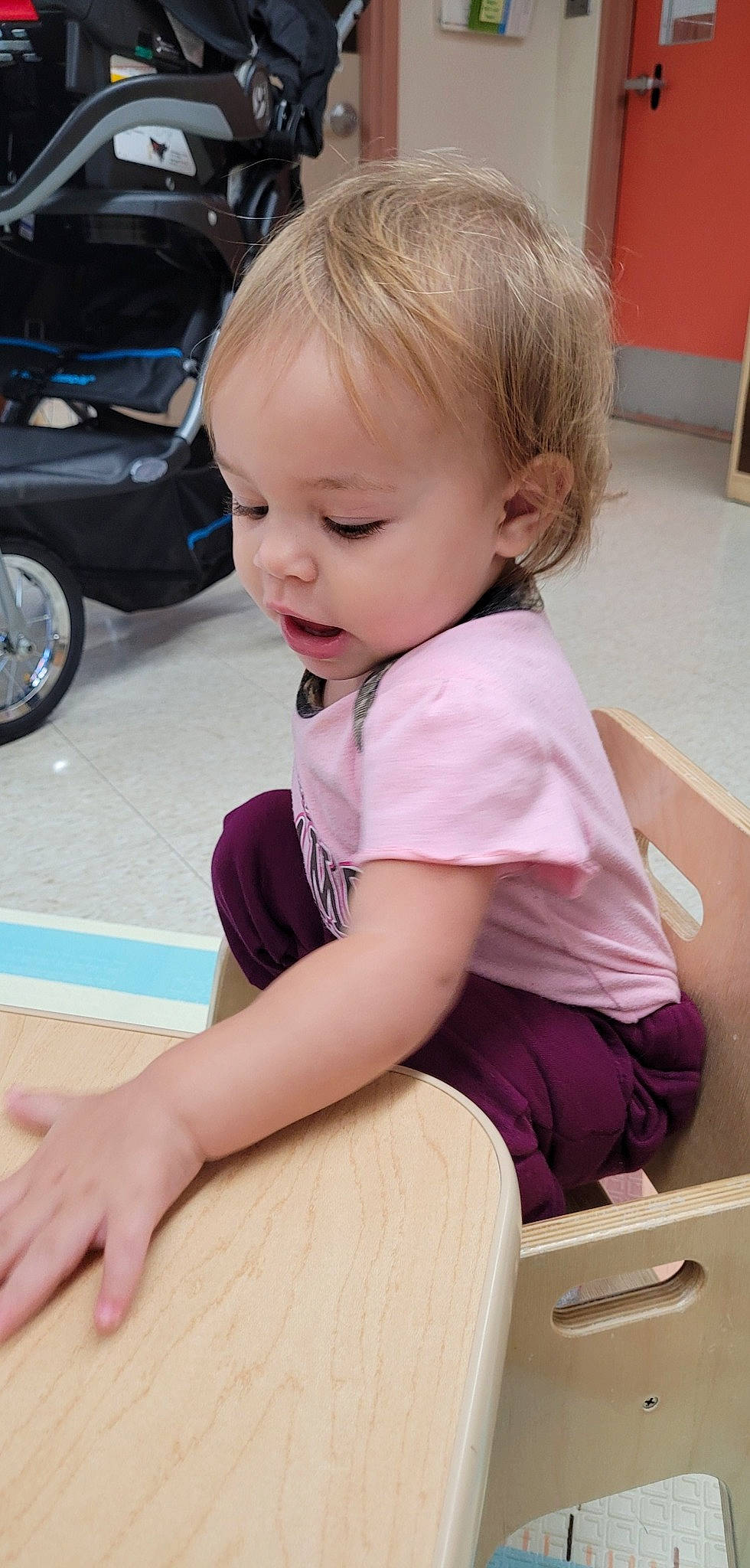Cecilia Marie is registered to the contest to win money with this photo: automotive_tire, baby, baby_toddler_clothing, blond, car, cheek, child, flooring, fun, person, personal_luxury_car, pink, skin, sleeve, smile, thigh, tire, toddler, vehicle, vehicle_door