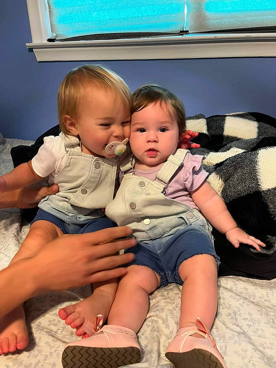 Cecilia Marie is registered to the contest to win money with this photo: baby_toddler_clothing, blue, cheek, chin, comfort, couch, eye, facial_expression, hairstyle, happy, interaction, lap, leg, mouth, person, picture_frame, shoe, shorts, skin, thigh