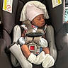 newborn, baby, car_seat, chicco, infant, hat, mittens, socks, sleeping, straps, safety, seat_belt, child, clothing, fabric, comfort, indoor, resting, person, cute