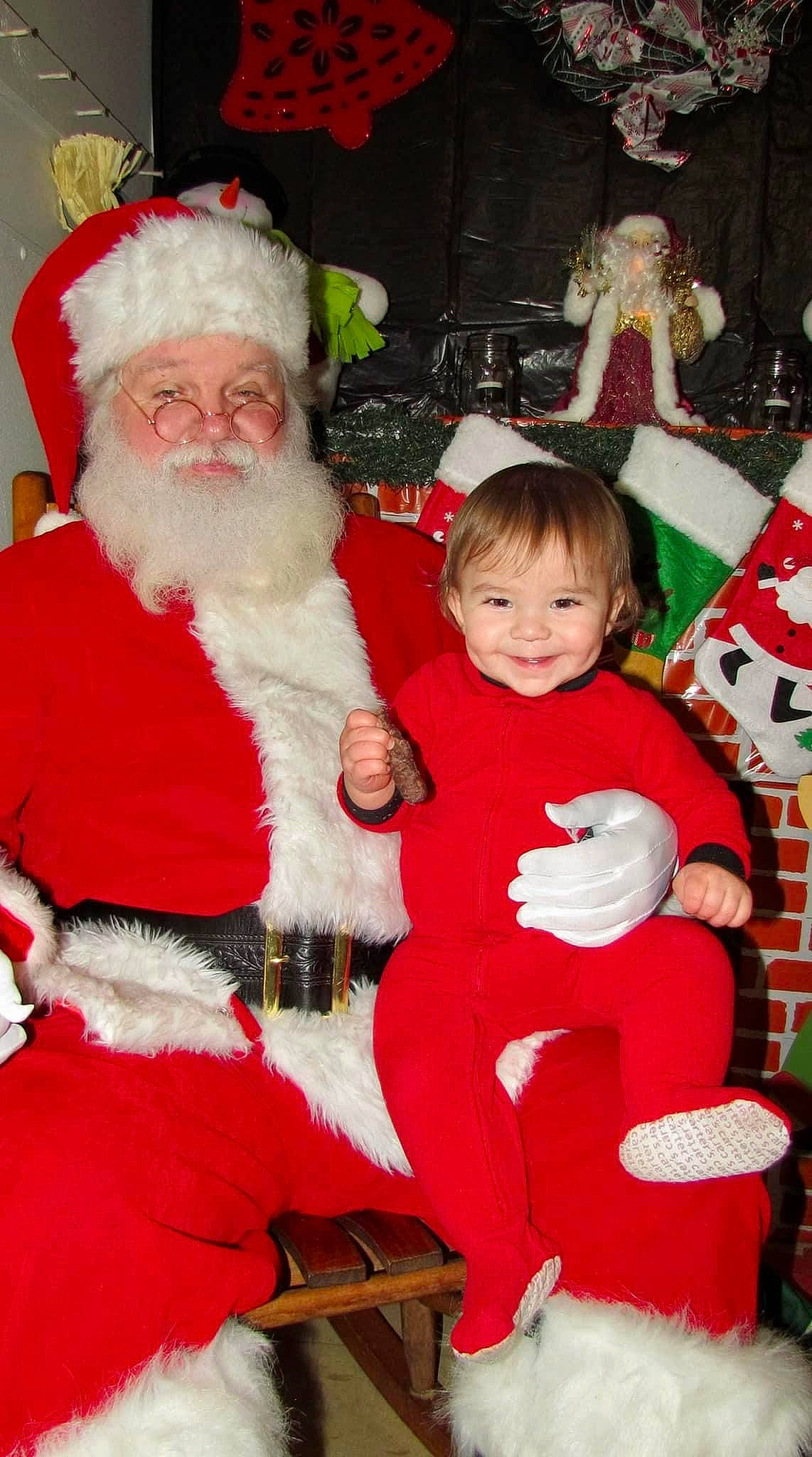 Kaiden is registered to the contest to win money with this photo: beard, carmine, christmas, christmas_eve, event, facial_expression, facial_hair, fictional_character, fun, fur, happy, hat, holiday, human_body, joy, lap, person, red, santa_claus, smile