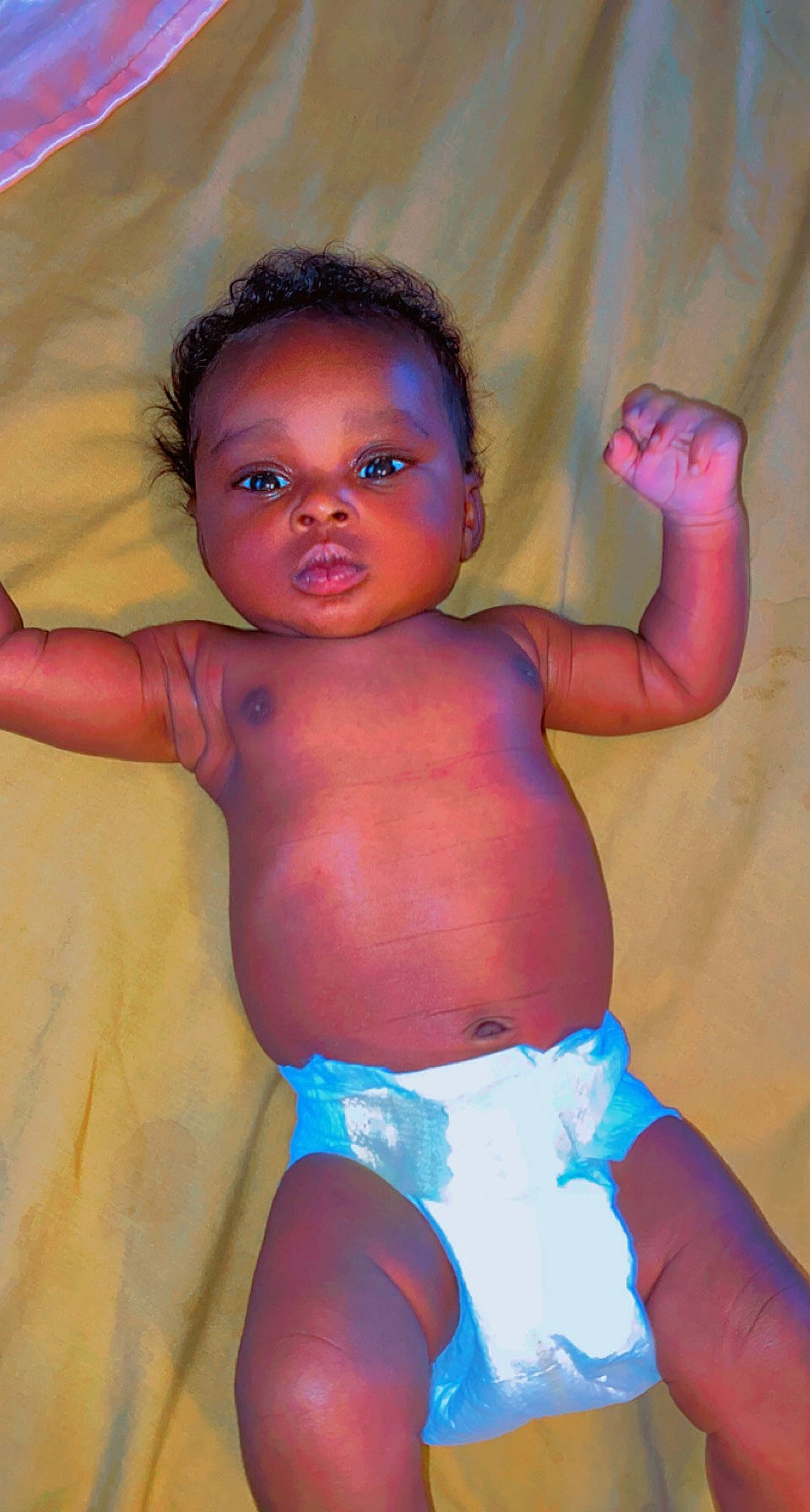 Jesiah is registered to the contest to win money with this photo: azure, baby, chest, eye, finger, human_body, iris, joint, leg, lip, mouth, muscle, neck, orange, organ, person, pink, skin, stomach, thigh