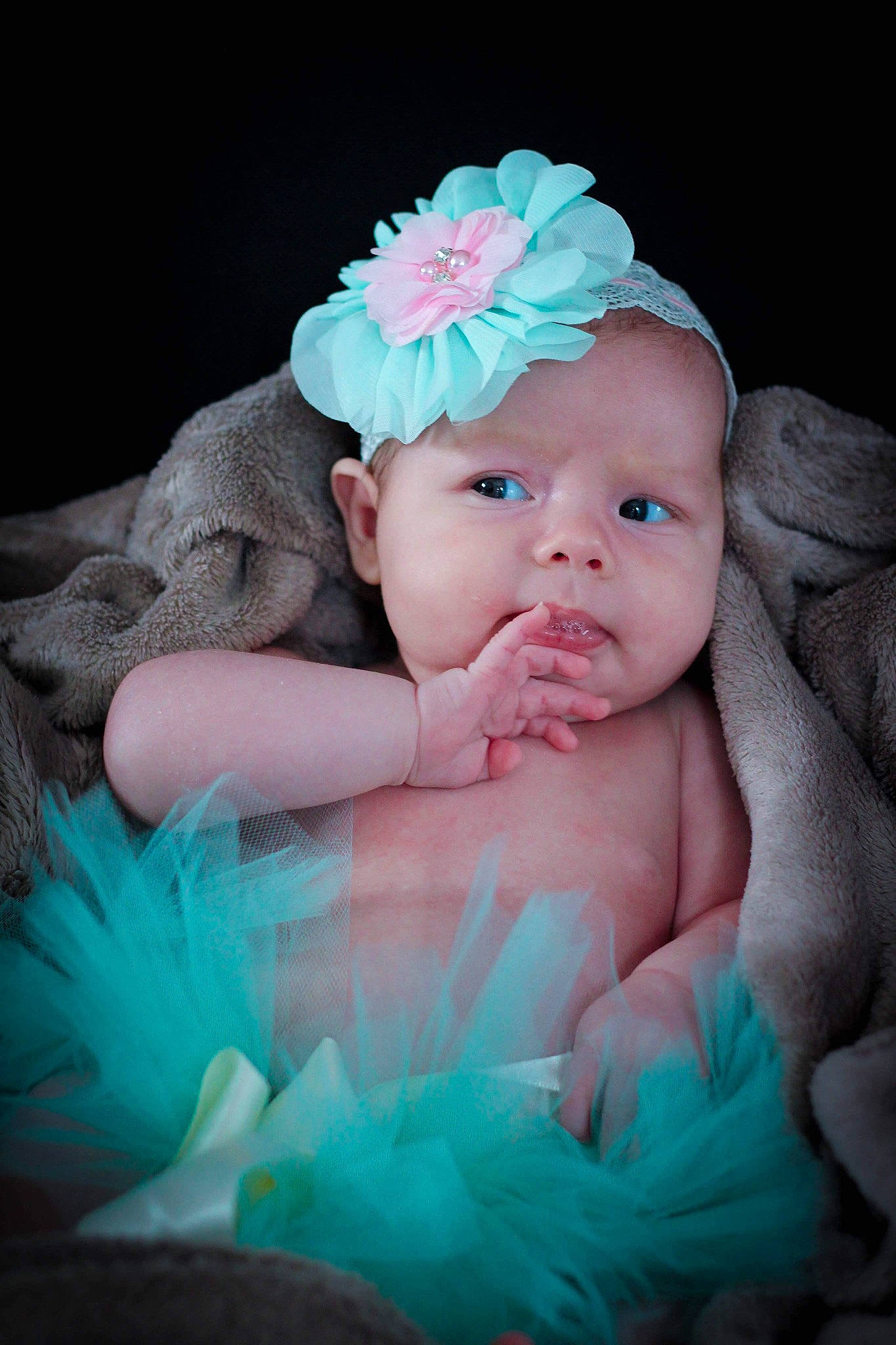 Callie participe au concours pour gagner de l'argent avec cette photo : aqua, baby, baby_toddler_clothing, cap, cheek, child, comfort, eye, face, finger, flash_photography, grass, hand, happy, headgear, headpiece, headwear, iris, person, pink