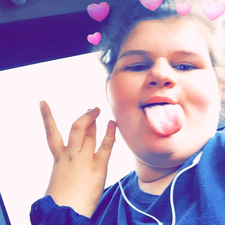 Tiffany joined the competition — help win amazing prizes! cheek, child, cool, ear, face, facial_expression, finger, fun, gesture, hand, happy, magenta, person, pink, purple, skin, sky, smile, thumb, toddler