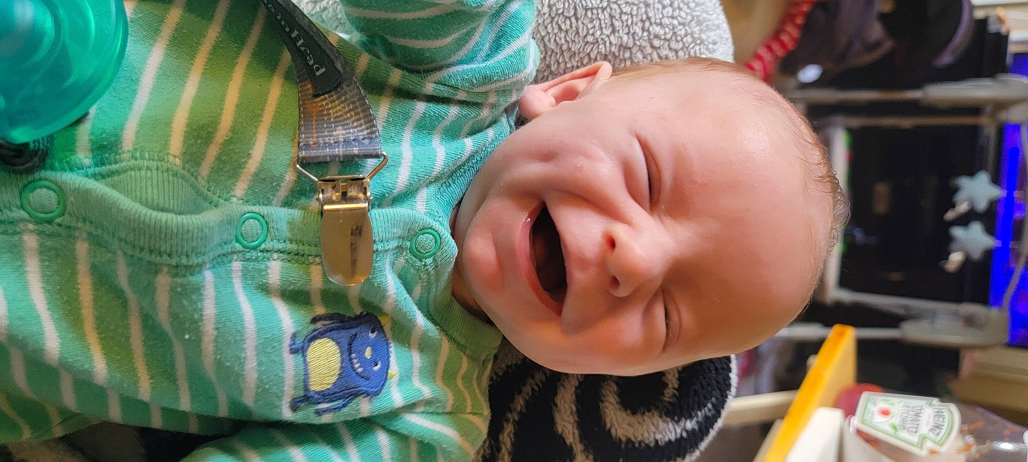 Chase is registered to the contest to win money with this photo: baby, baby_toddler_clothing, cheek, chin, eye, eyebrow, facial_expression, finger, green, hairstyle, happy, human, iris, lip, mouth, nose, person, product, skin, sleeve