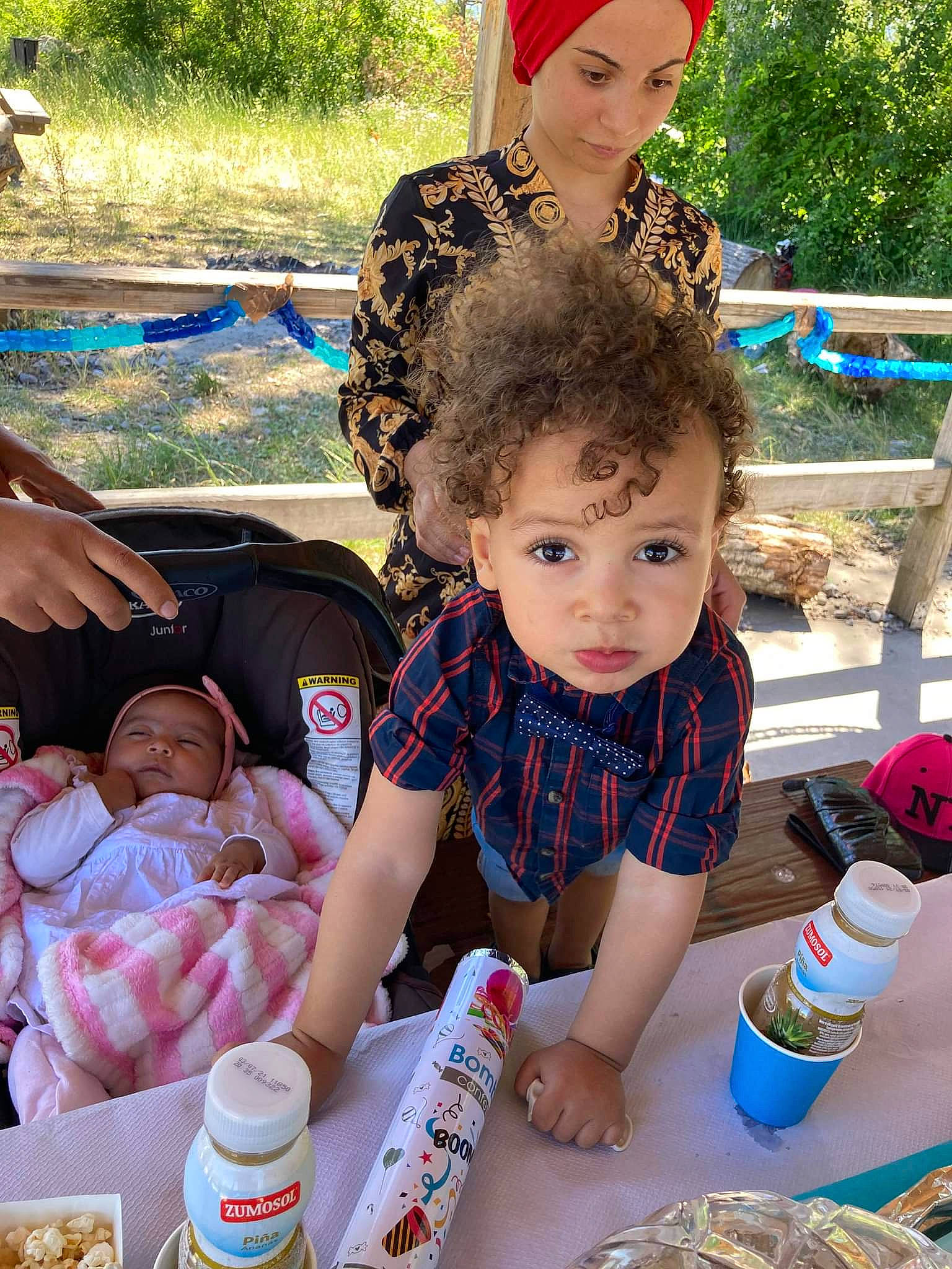 Chams Eddine participe au concours pour gagner de l'argent avec cette photo : baby, baby_toddler_clothing, child, event, fashion_accessory, fun, grass, happy, headwear, leisure, people, person, photograph, plant, play, recreation, sharing, sitting, snapshot, summer