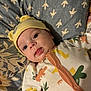 applique, baby, bed, blanket, bonnet, cap, clothing, couch, face, furniture, happy, hat, head, newborn, pattern, person, photography, portrait, quilt, smile