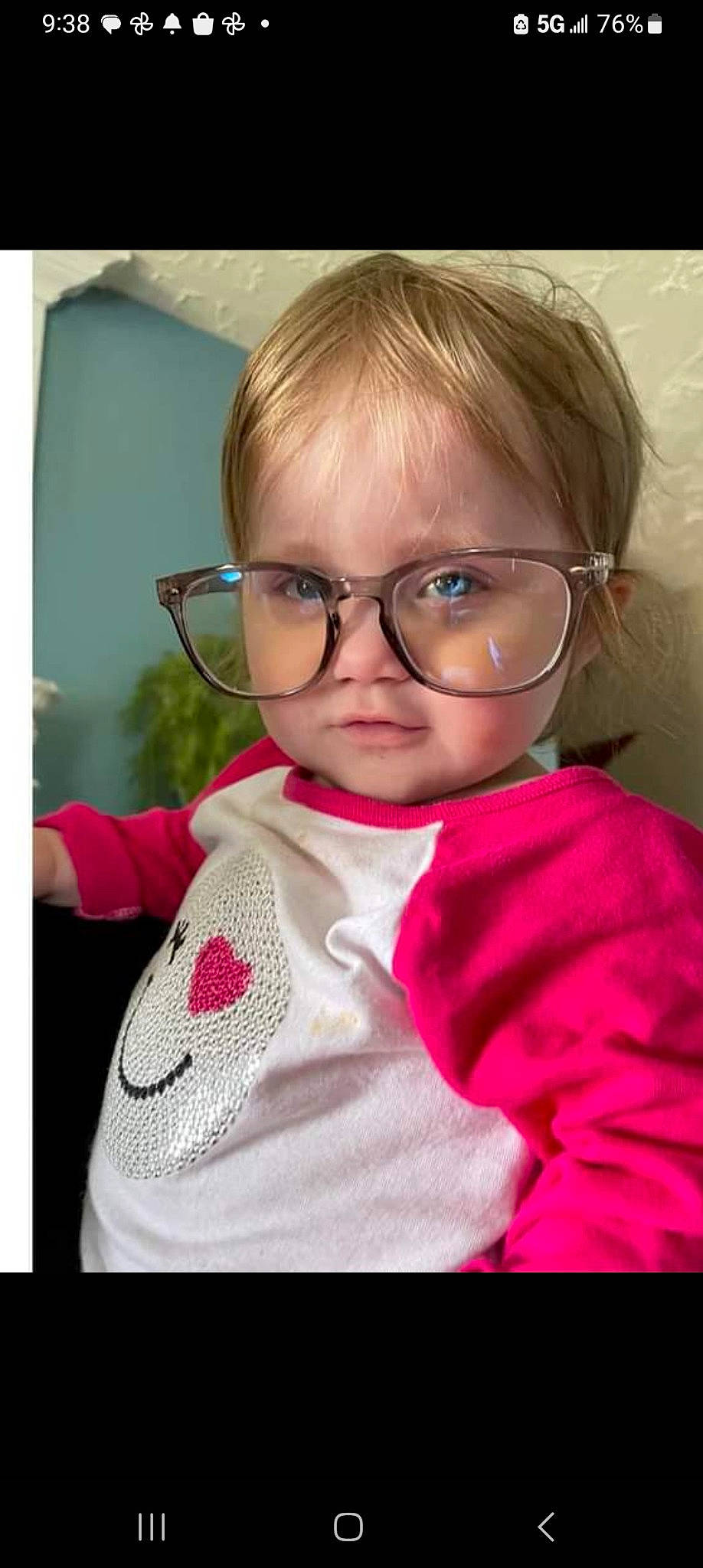 Jolene is registered to the contest to win money with this photo: baby_toddler_clothing, blond, cheek, child, ear, eyelash, eyewear, fun, glasses, hairstyle, happy, lip, magenta, nose, pattern, person, personal_protective_equipment, pink, sleeve, toddler