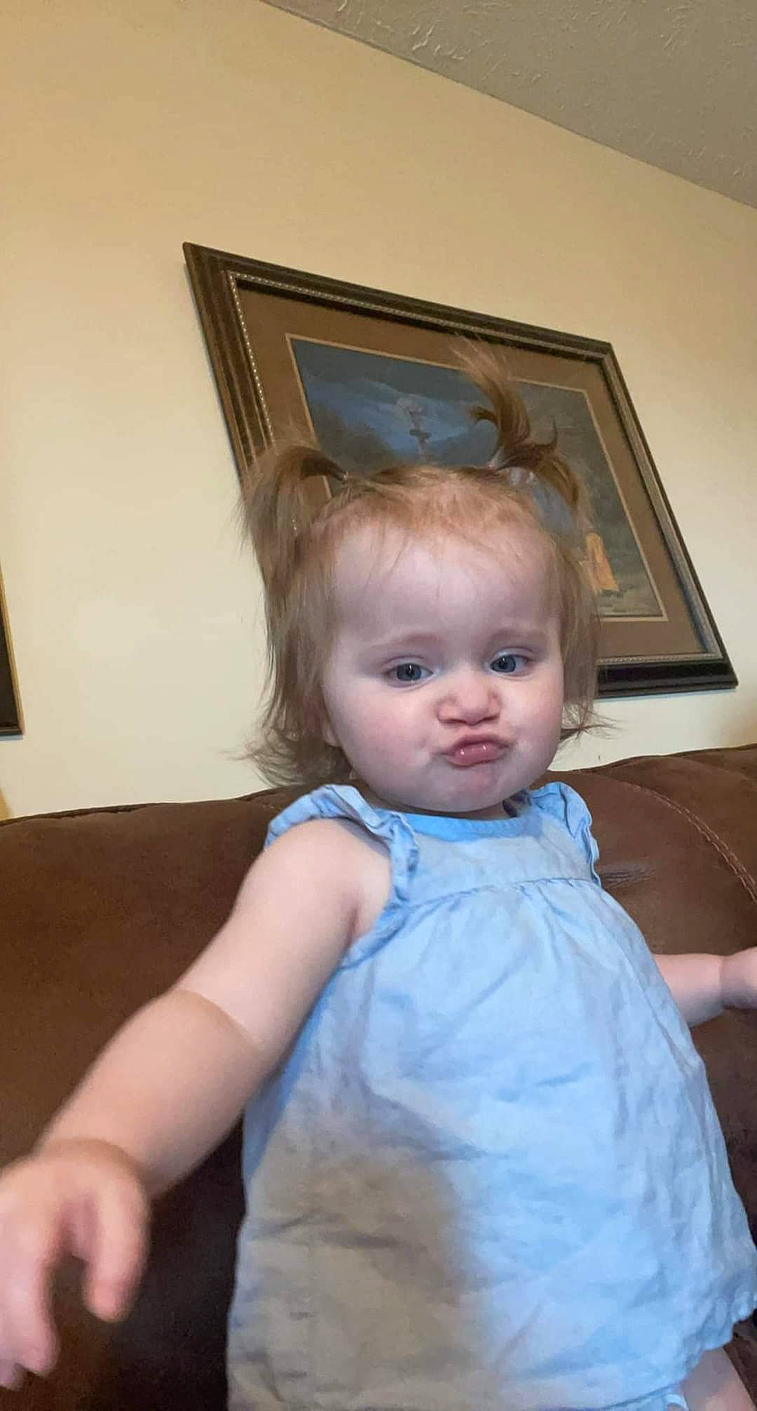 Jolene is registered to the contest to win money with this photo: art, baby_toddler_clothing, cheek, child, couch, day_dress, dress, eye, flash_photography, fun, hair, happy, head, iris, one_piece_garment, person, picture_frame, sitting, skin, smile