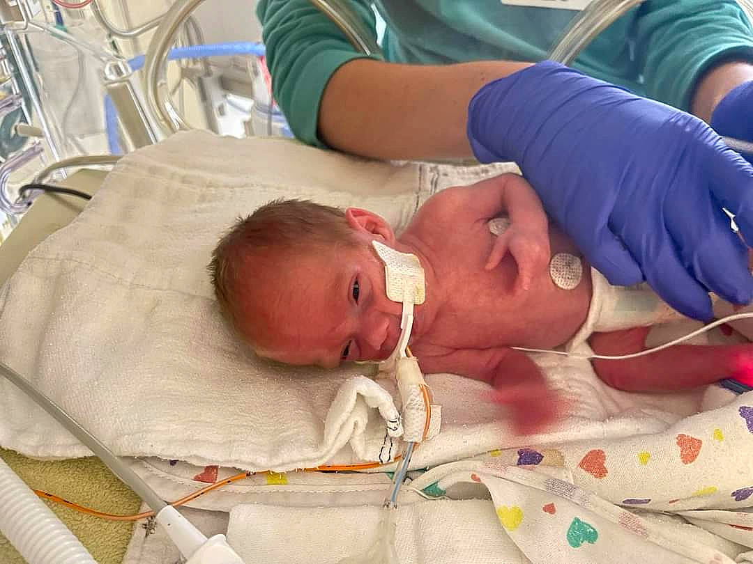 Parker joined the competition — help win amazing prizes! abdomen, baby, chest, child, childbirth, comfort, event, hat, health_care, hospital, linens, medical, medical_equipment, medical_procedure, mouth, patient, pediatrics, person, service, skin