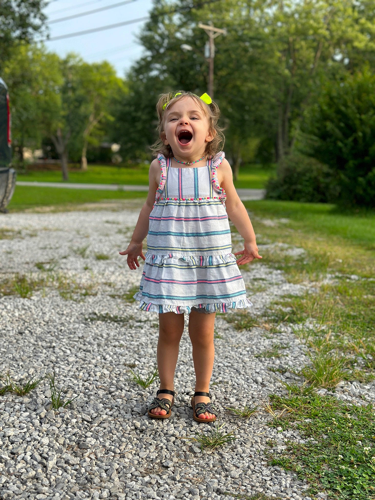 Shayleigh is registered to the contest to win money with this photo: asphalt, child, day_dress, dress, fun, grass, happy, leisure, pattern, people_in_nature, person, plaid, plant, recreation, sky, smile, summer, toddler, tree, vintage_clothing