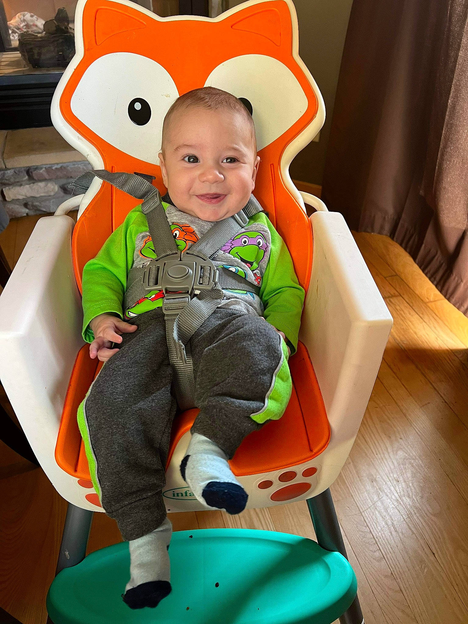 Koltyn is registered to the contest to win money with this photo: baby, baby_products, baby_toddler_clothing, chair, child, comfort, costume_hat, couch, eye, fun, green, happy, hat, joy, lap, person, personal_protective_equipment, product, sitting, smile