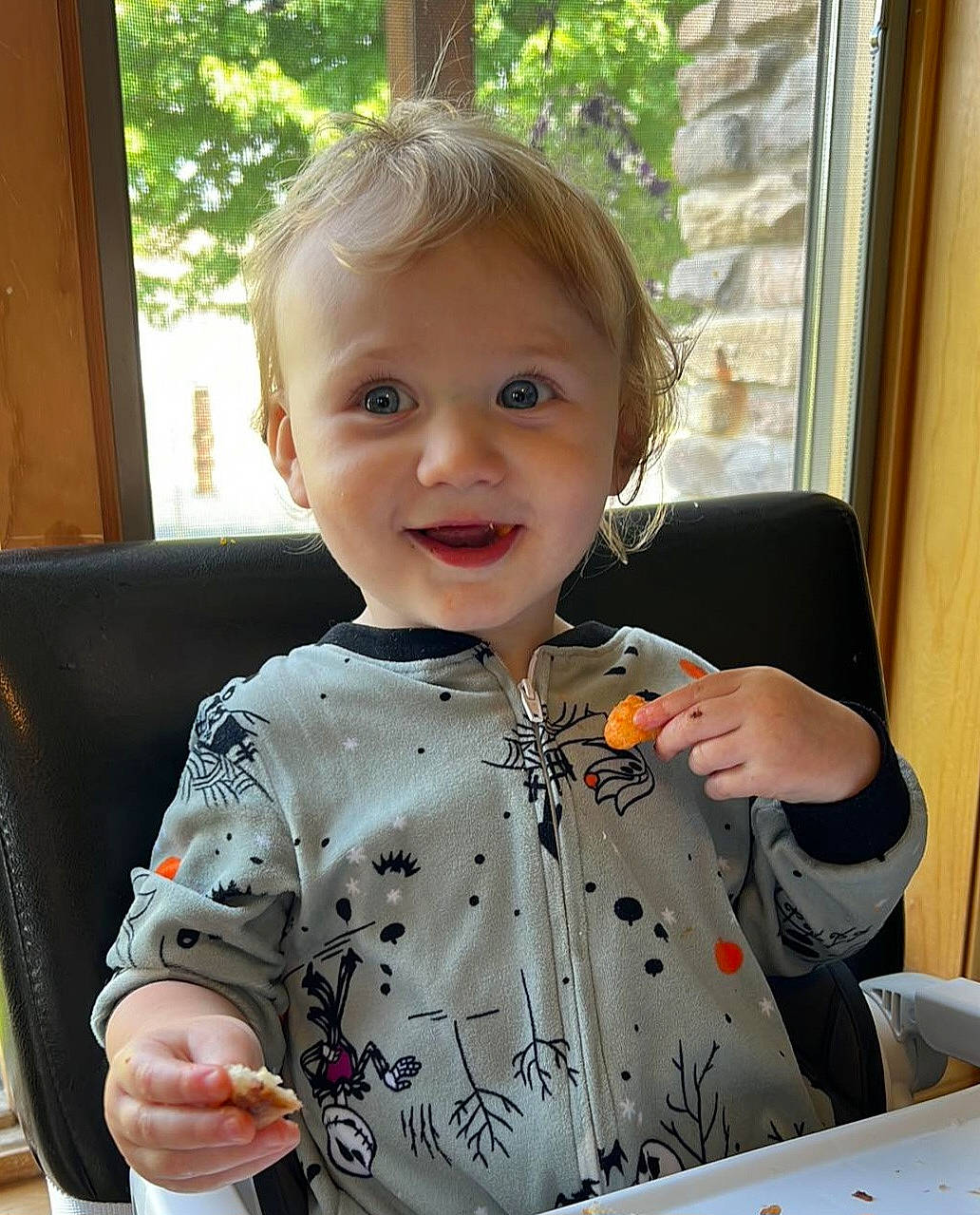 Ayden is registered to the contest to win money with this photo: baby, baby_toddler_clothing, chair, cheek, child, curtain, dress_shirt, finger, happy, pattern, person, sitting, sleeve, smile, t_shirt, tableware, thumb, toddler, tree, vacation