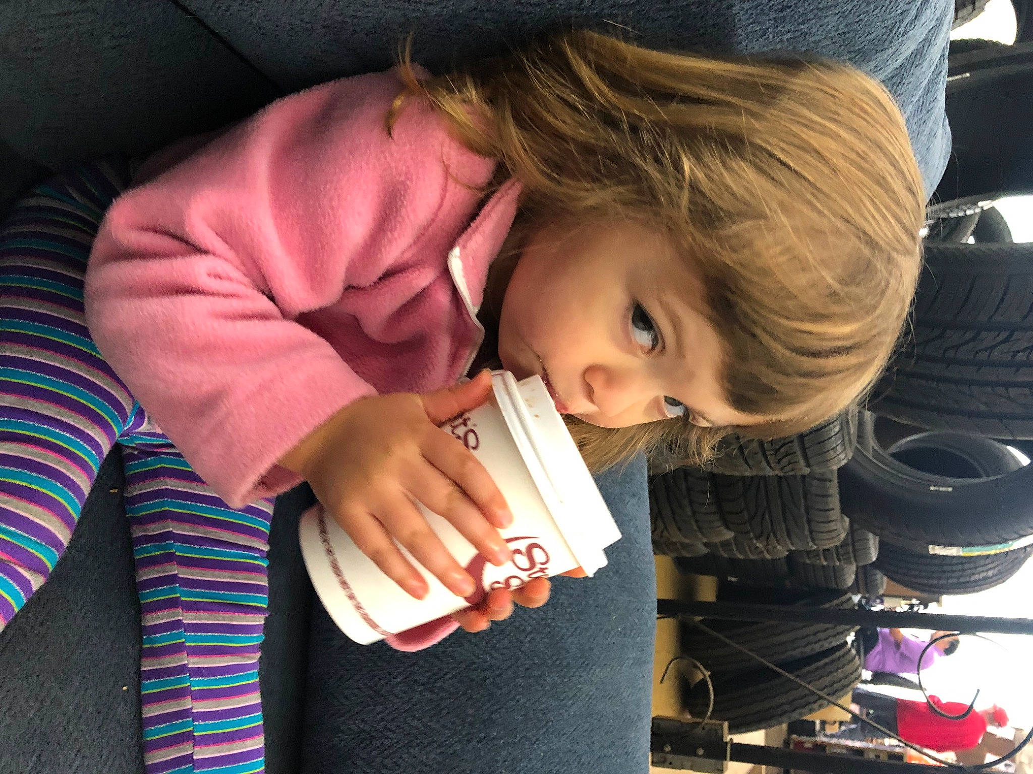 Savanna is registered to the contest to win money with this photo: auto_part, baby_products, bangs, car_seat, cheek, child, comfort, fun, happy, hat, lap, luxury_vehicle, nail, person, play, sitting, toddler, vacation