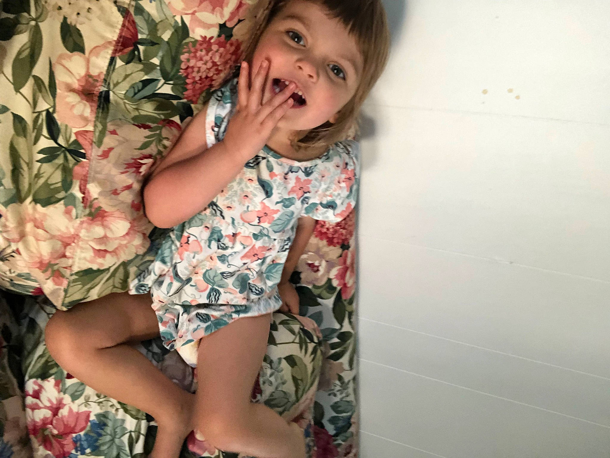 Savanna is registered to the contest to win money with this photo: black_hair, dress, face, finger, flash_photography, hair, hairstyle, hand, happy, human_body, human_leg, knee, leg, long_hair, person, plant, shorts, skin, sleeve, smile