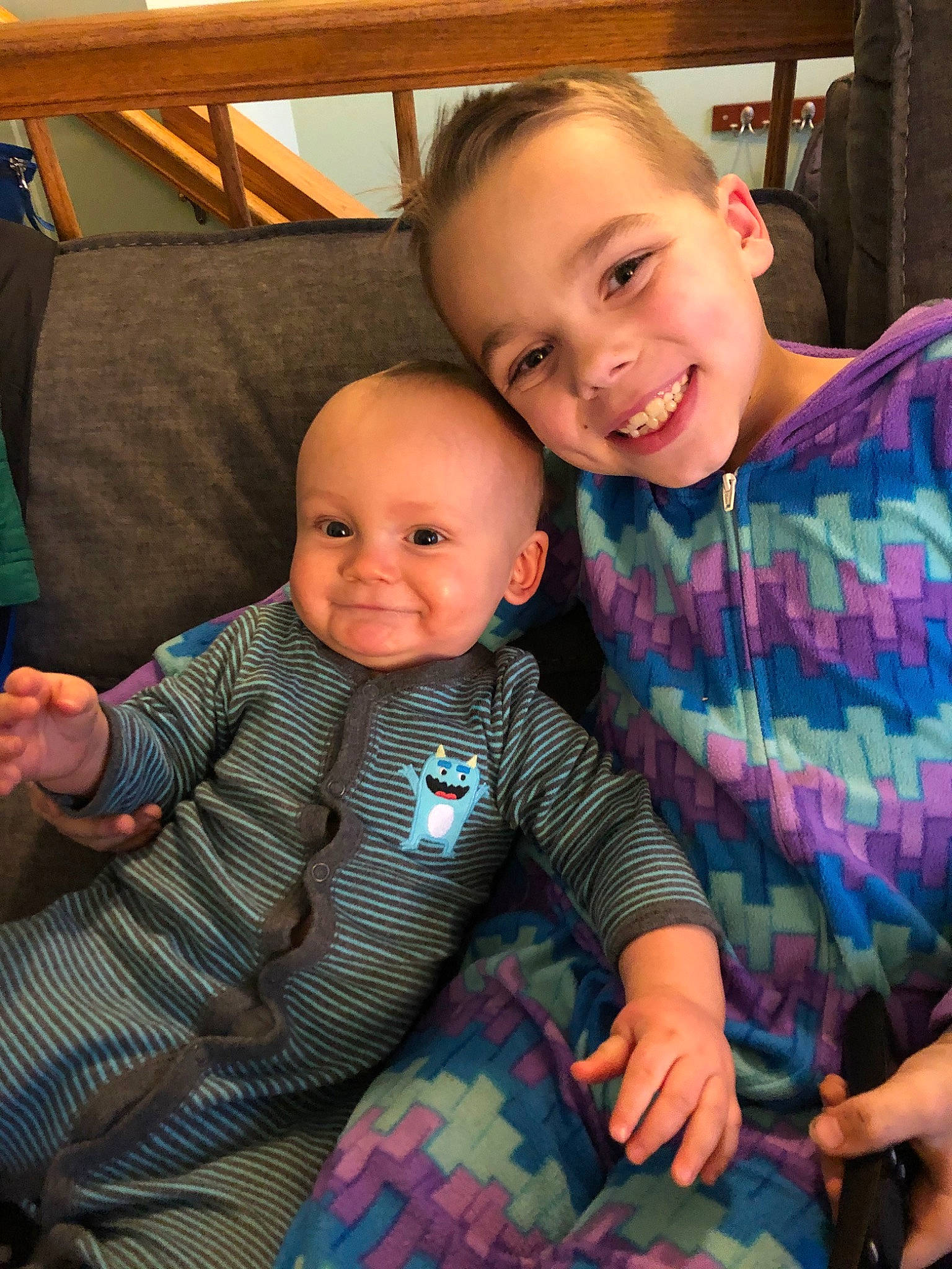 Rowan joined the competition — help win amazing prizes! baby, cheek, child, eye, face, family, happy, head, iris, joy, lap, nose, pattern, people, person, plaid, play, sibling, sitting, skin