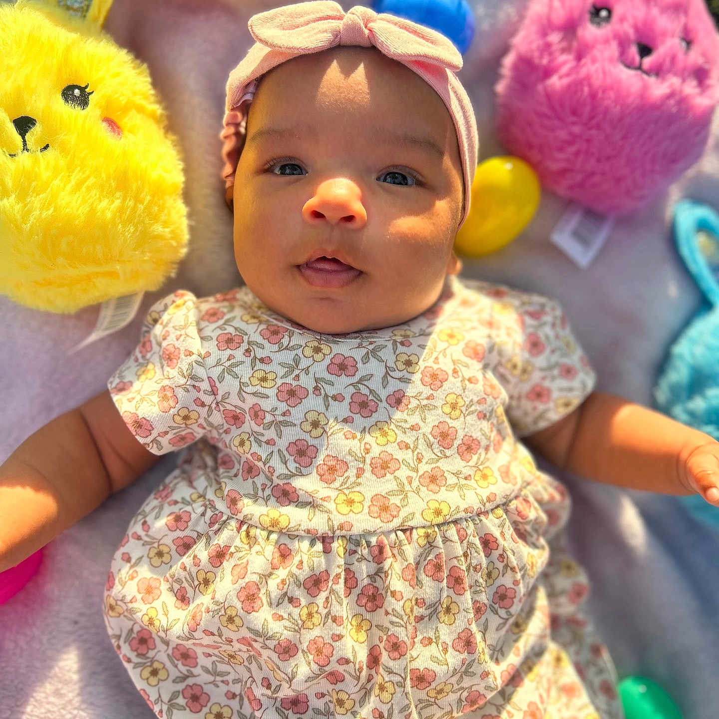 Delila is registered to the contest to win money with this photo: accessories, baby, cap, clothing, cushion, dress, face, furniture, happy, hat, head, homedecor, newborn, person, photography, portrait, purple, quilt, sunglasses, toy