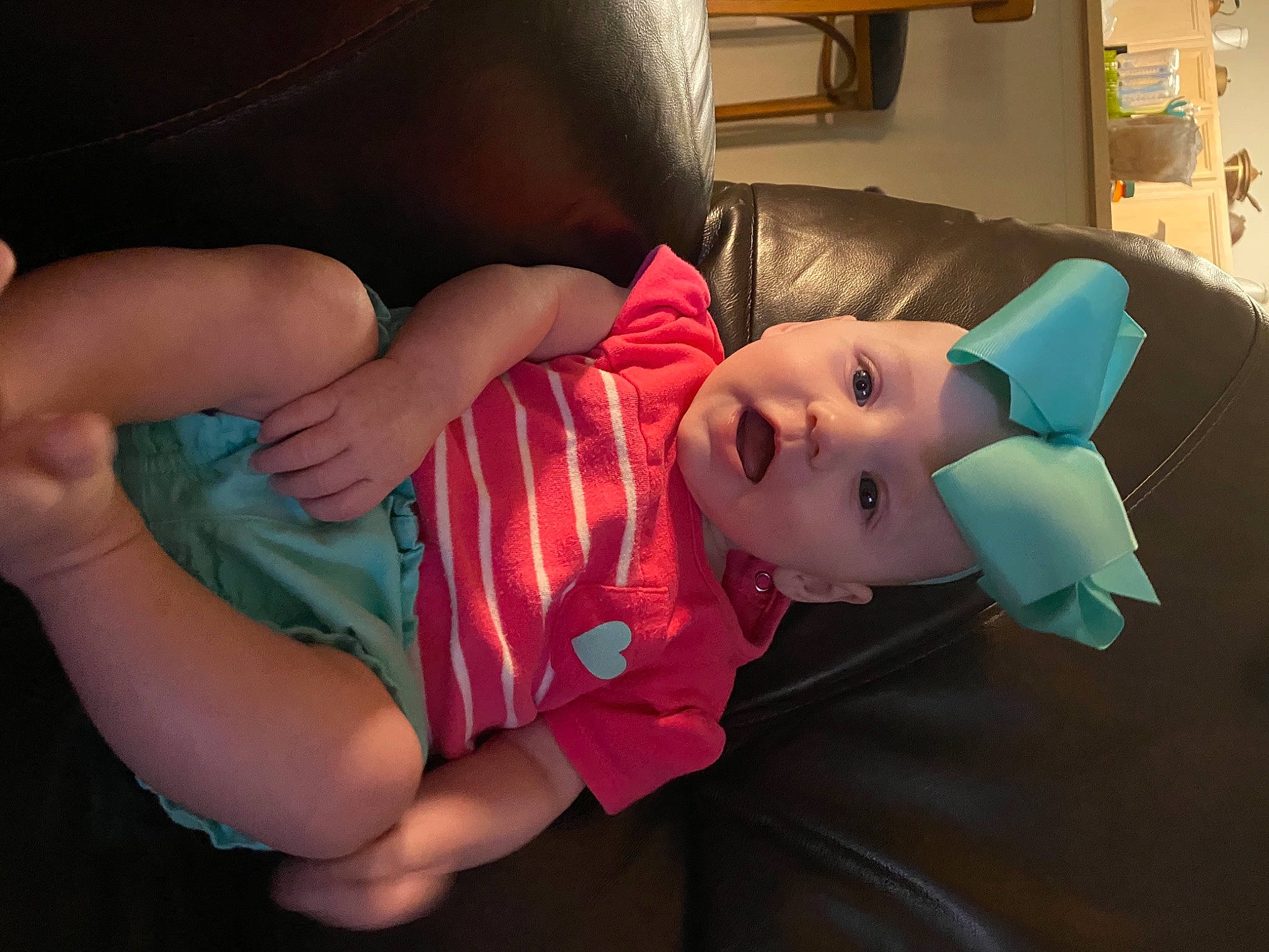 Ashlyn joined the competition — help win amazing prizes! baby, baby_toddler_clothing, child, comfort, elbow, finger, foot, fun, glasses, hat, human_leg, joint, knee, mouth, person, room, sitting, skin, t_shirt, thigh
