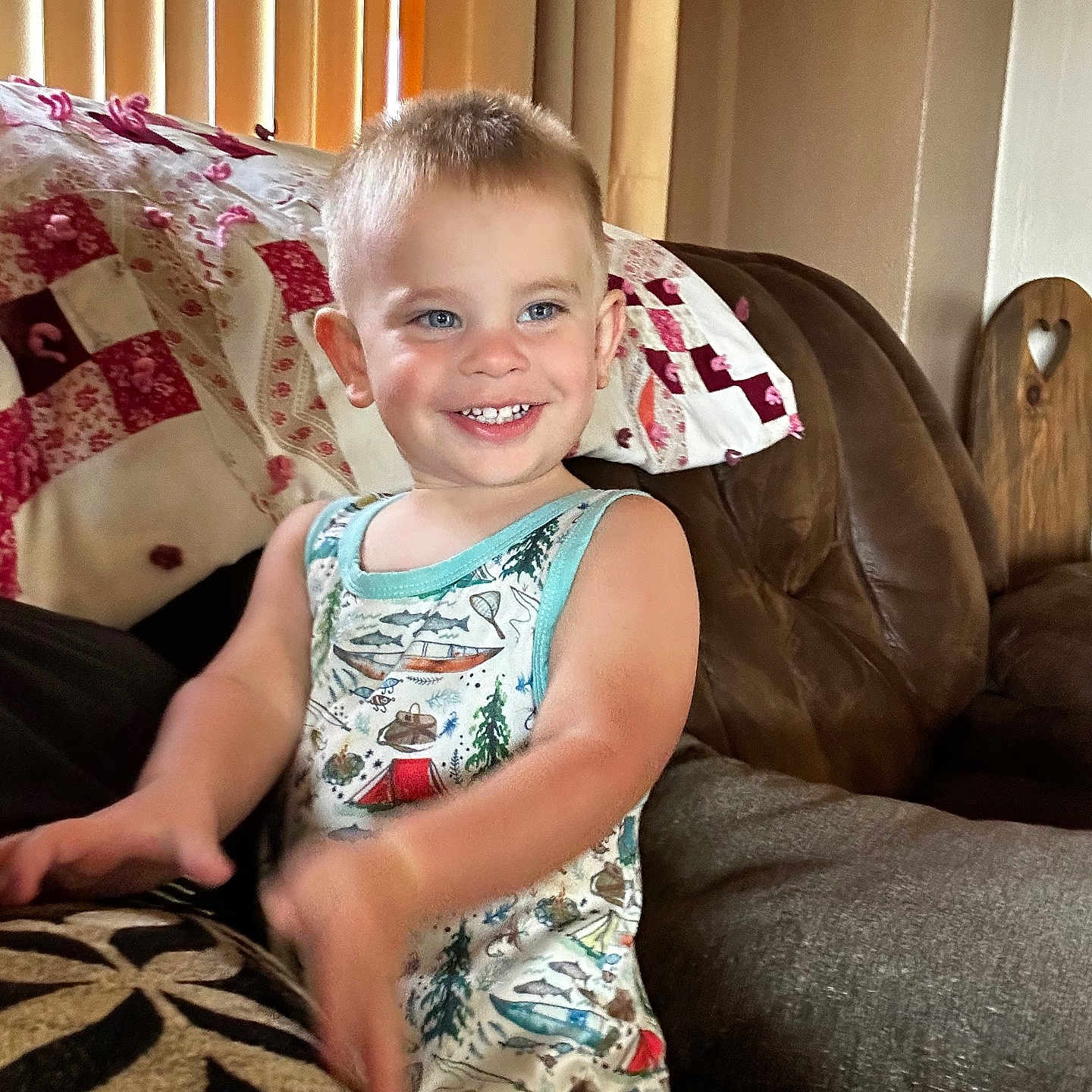 Jameson joined the competition — help win amazing prizes! architecture, baby, building, clothing, couch, cushion, face, furniture, happy, head, homedecor, indoors, livingroom, person, photography, portrait, room, sitting, smile, t_shirt