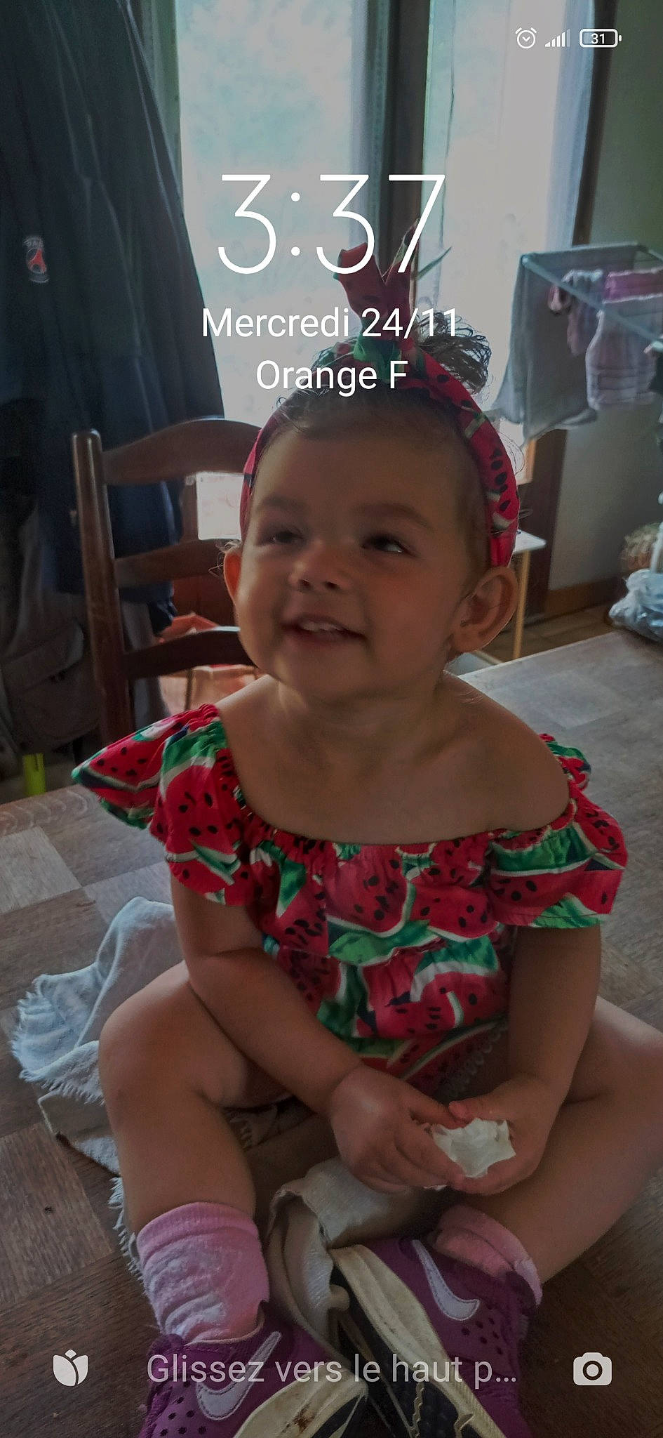 Lilou participe au concours pour gagner de l'argent avec cette photo : baby_toddler_clothing, chair, cheek, child, chin, event, facial_expression, fun, happy, headpiece, human_leg, joy, lap, mouth, person, pink, sitting, skin, smile, summer