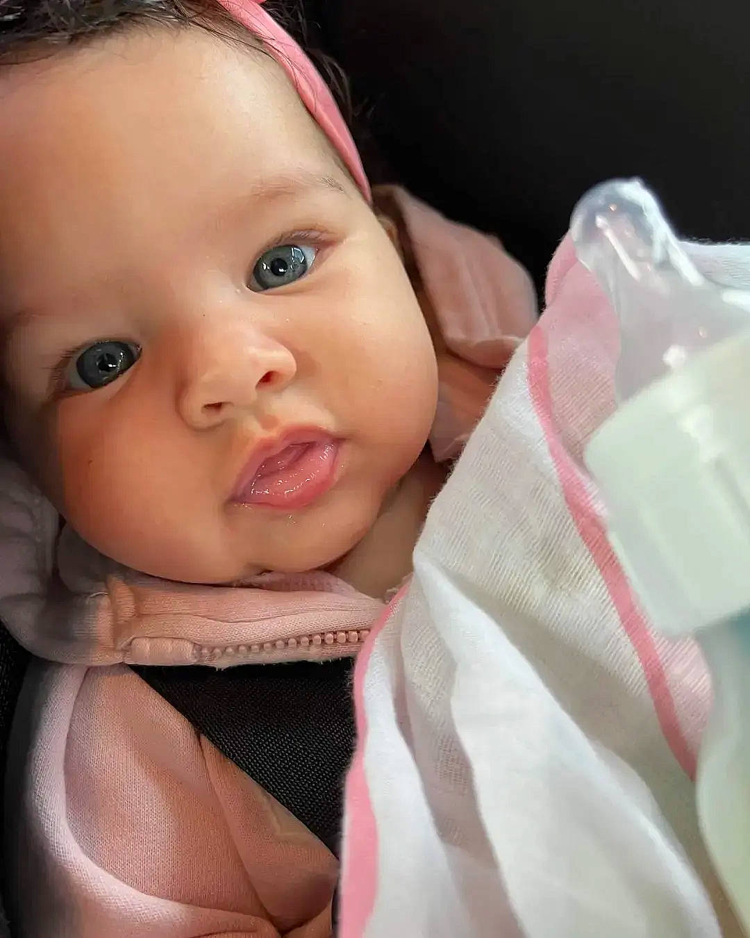 Ruth is registered to the contest to win money with this photo: baby, baby_toddler_clothing, cheek, chin, ear, eye, eyebrow, eyelash, face, facial_expression, finger, happy, iris, lip, neck, nose, person, pink, skin, sleeve