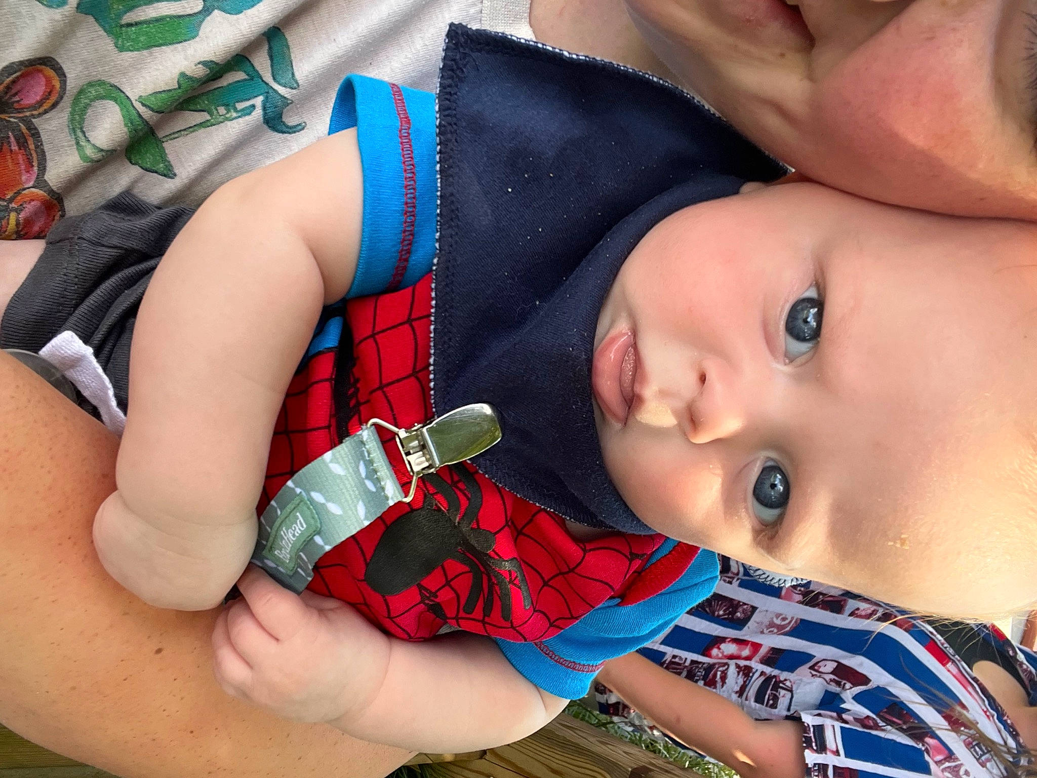 Link is registered to the contest to win money with this photo: arm, baby, baby_toddler_clothing, cheek, chest, eye, eyelash, finger, green, hand, happy, human_body, iris, lip, mouth, neck, nose, person, skin, textile